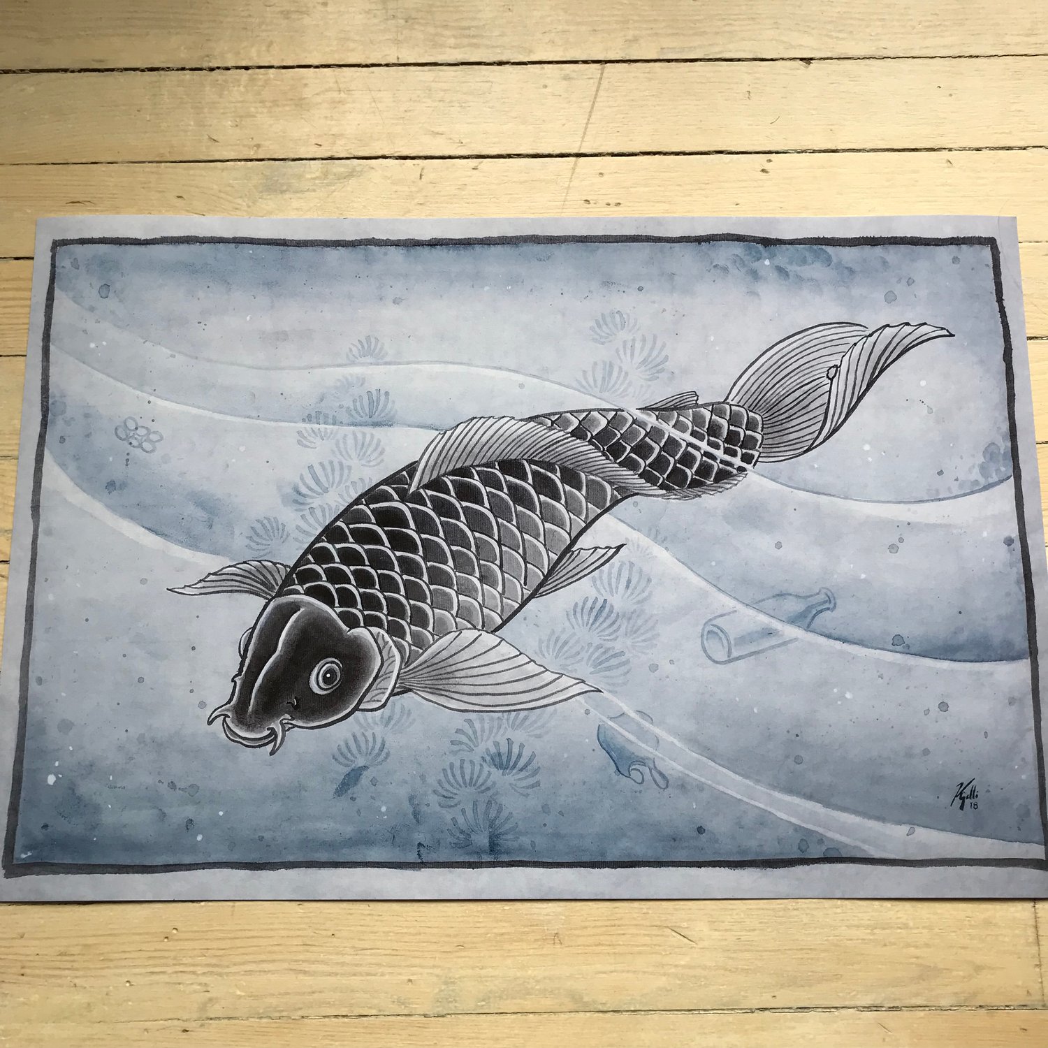Image of Koi with plastic