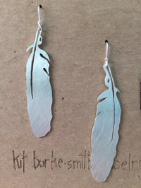 Magpie feather hanging silver earrings