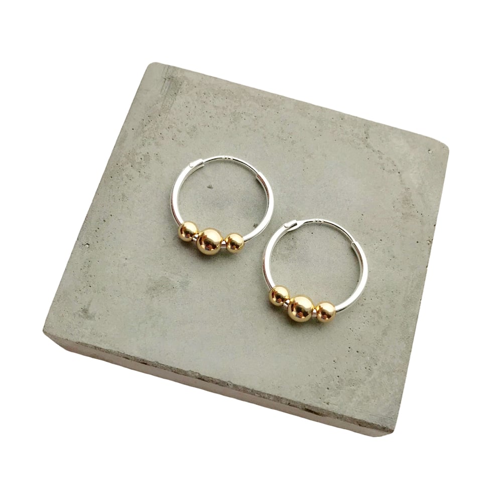 Image of Silver hoops with 3 gold beads