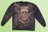 Image 1 of “THE MONSTER” CUSTOM BLEACH PAINTED PULLOVER SWEATSHIRT LARGE