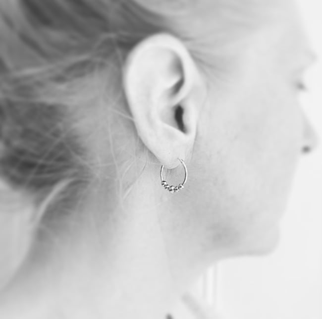 Silver hoops with 5 gold beads