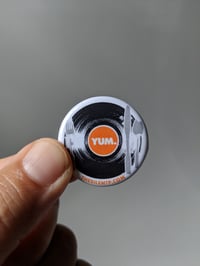 Image 1 of YUM.  Round button