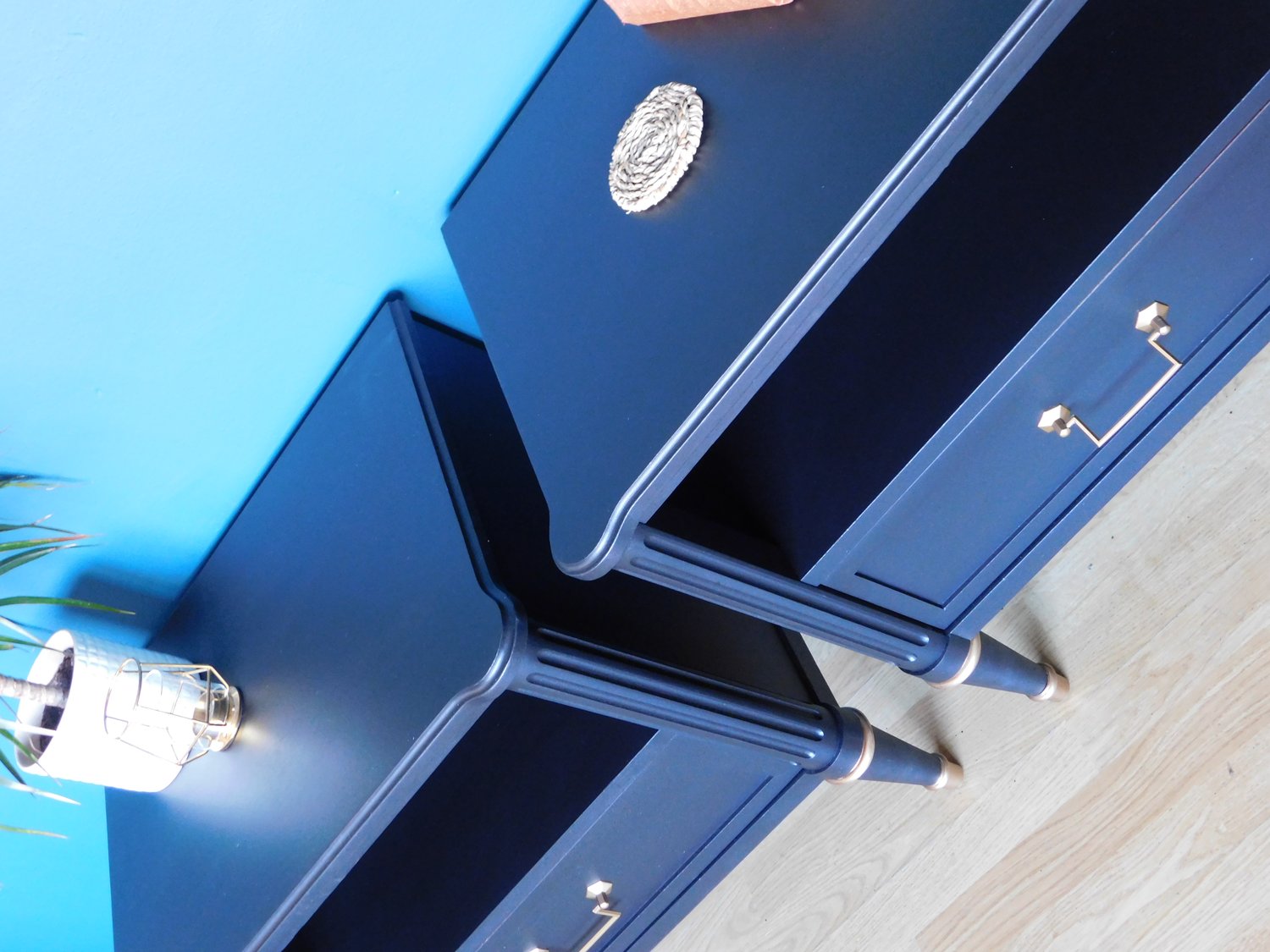 Image of A pair of black stag mahogany bedside tables 