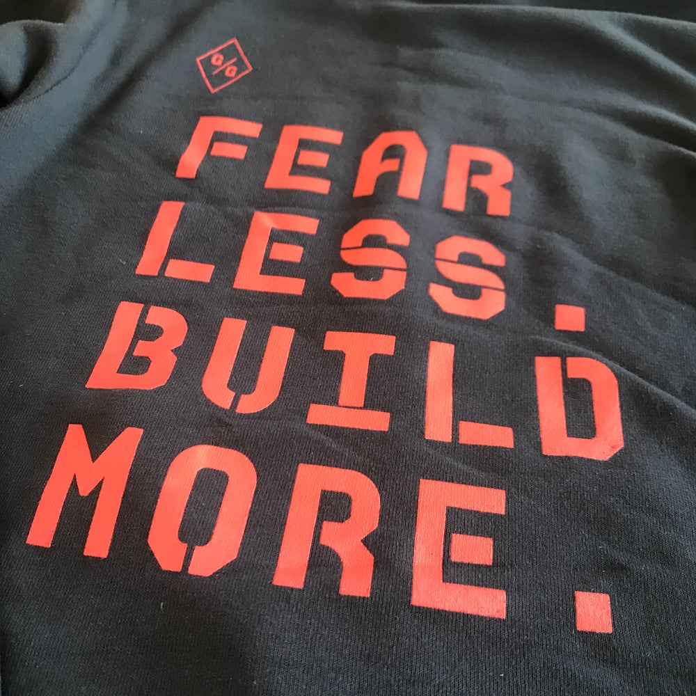 Fear Less. Build More. Zip-up hoodie