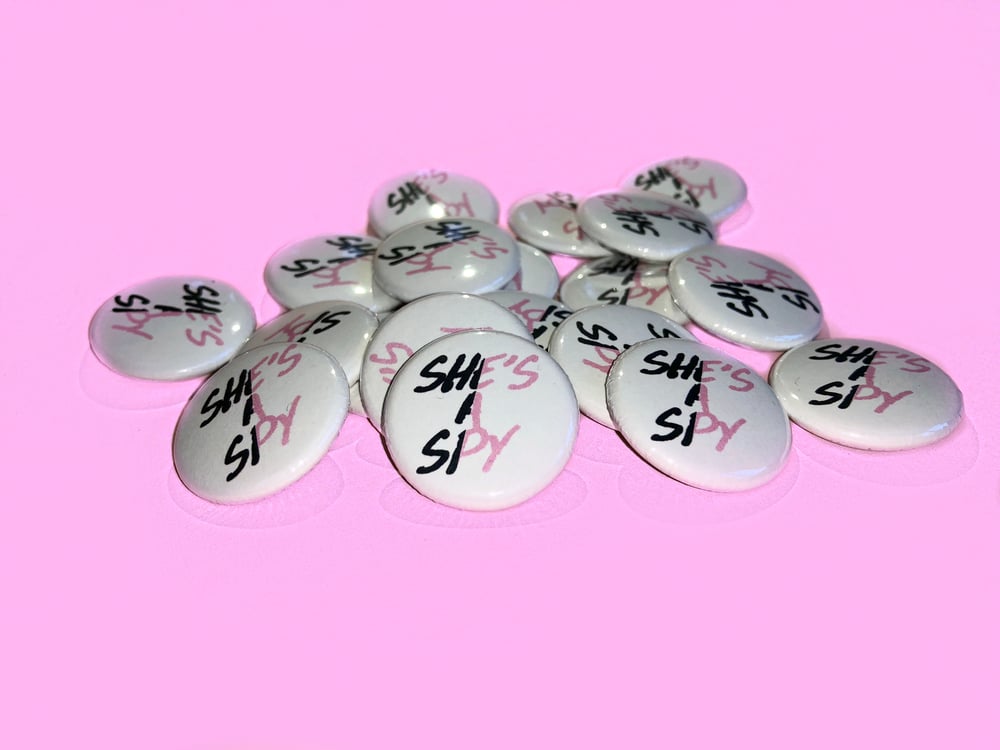 Image of SHE’S A SPY Logo Button