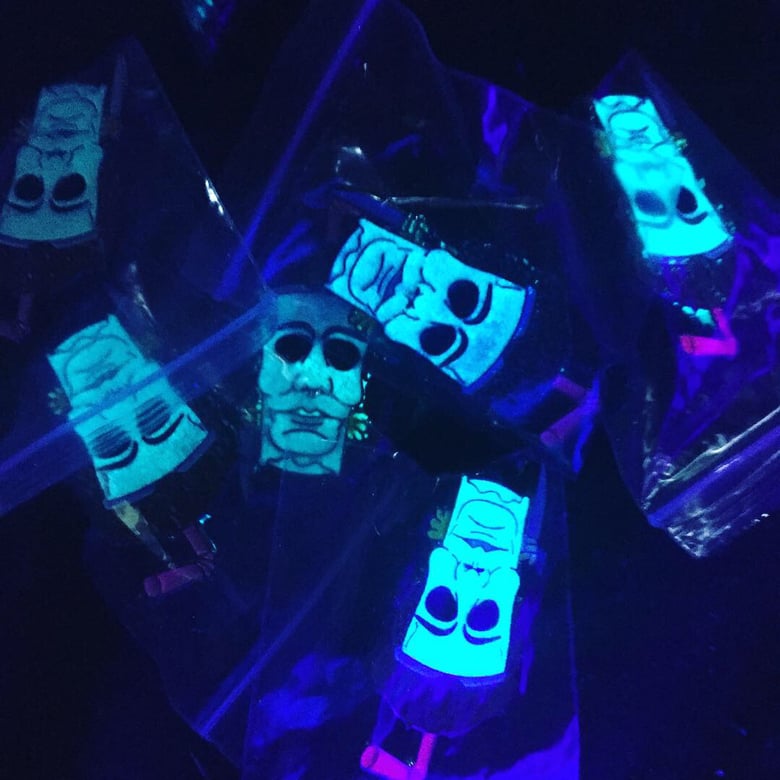 Image of Master Myers glowing ritual edition pin