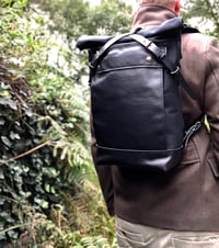 Image 2 of Black backpack medium size rucksack in waxed canvas, with leather front pocket and bottom