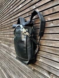 Image 3 of Black backpack medium size rucksack in waxed canvas, with leather front pocket and bottom