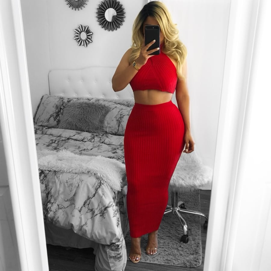 Image of Lady in red knit skirt set 
