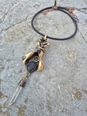 Bullet casings, pebbles and crystal necklace 