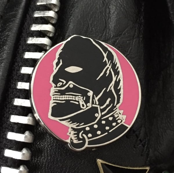 Image of Rubber Husband logo pin