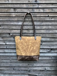 Image 1 of Tote bag in waxed canvas with leather handles and zipper closure