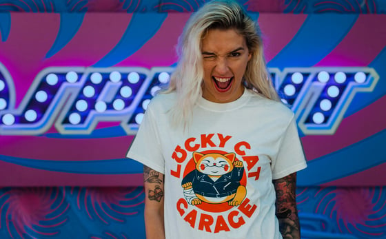 Image of Lucky Cat Garage Logo tee shirt. Woman cut.