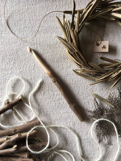 Image of size 9mm olive branch hand carved rustic crochet hook