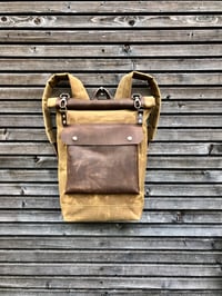 Image 1 of Waxed canvas rucksack/backpack with roll up top and double waxed bottem COLLECTION UNISEX