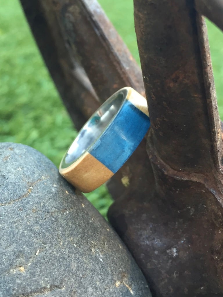 Image of Box elder burl wood with a bright blue resin section