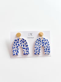 Paire de boucles d'oreilles céramique COWB riz bleu