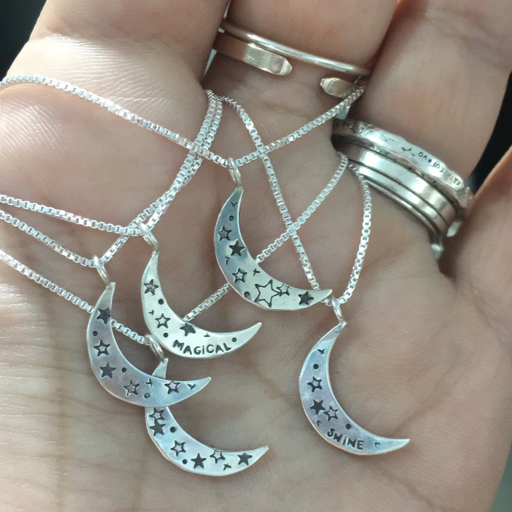 Image of tiny moon and stars necklace