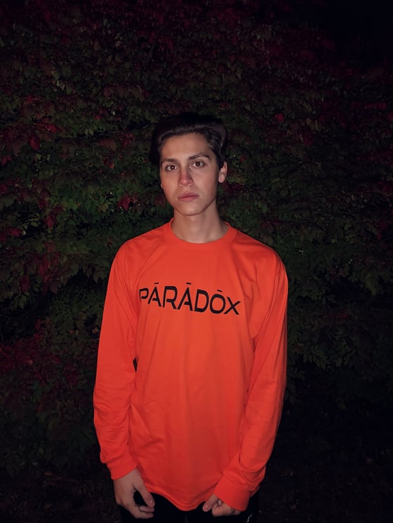 Image of ORANGE SWERVE TEXT LONG SLEEVE