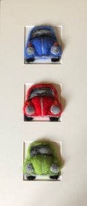 Image of "Three in a Box VW Beetle"