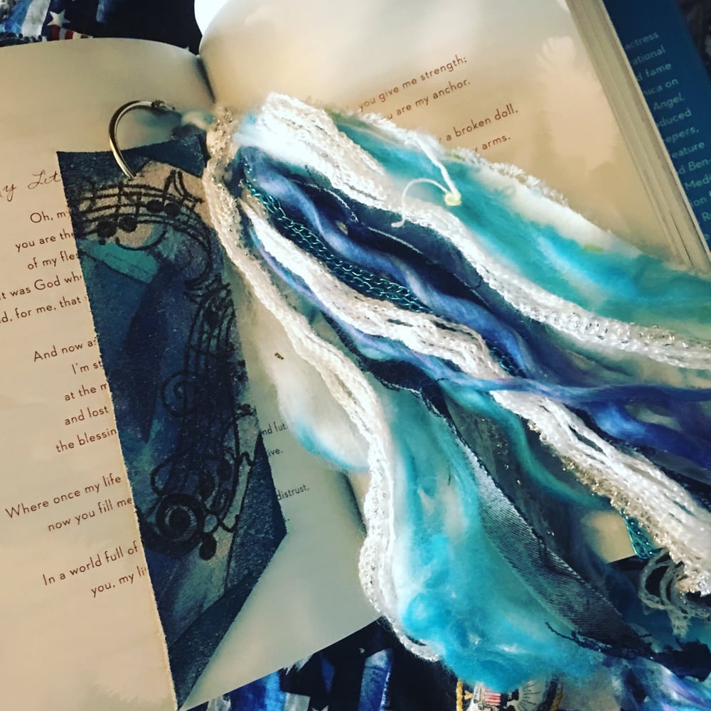 Image of Suede bookmark with tassel