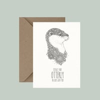 "Otterly in love" greeting card