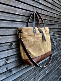 Image 5 of  Tote bag in waxed canvas with leather bottom and cross body strap