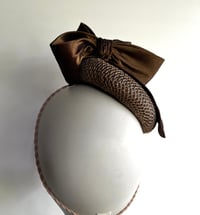 Image 4 of Gold button headpiece.