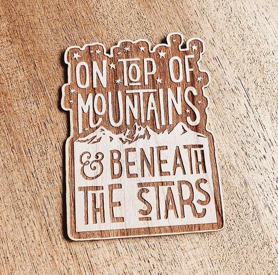 Image of ON TOP OF MOUNTAINS wooden sticker