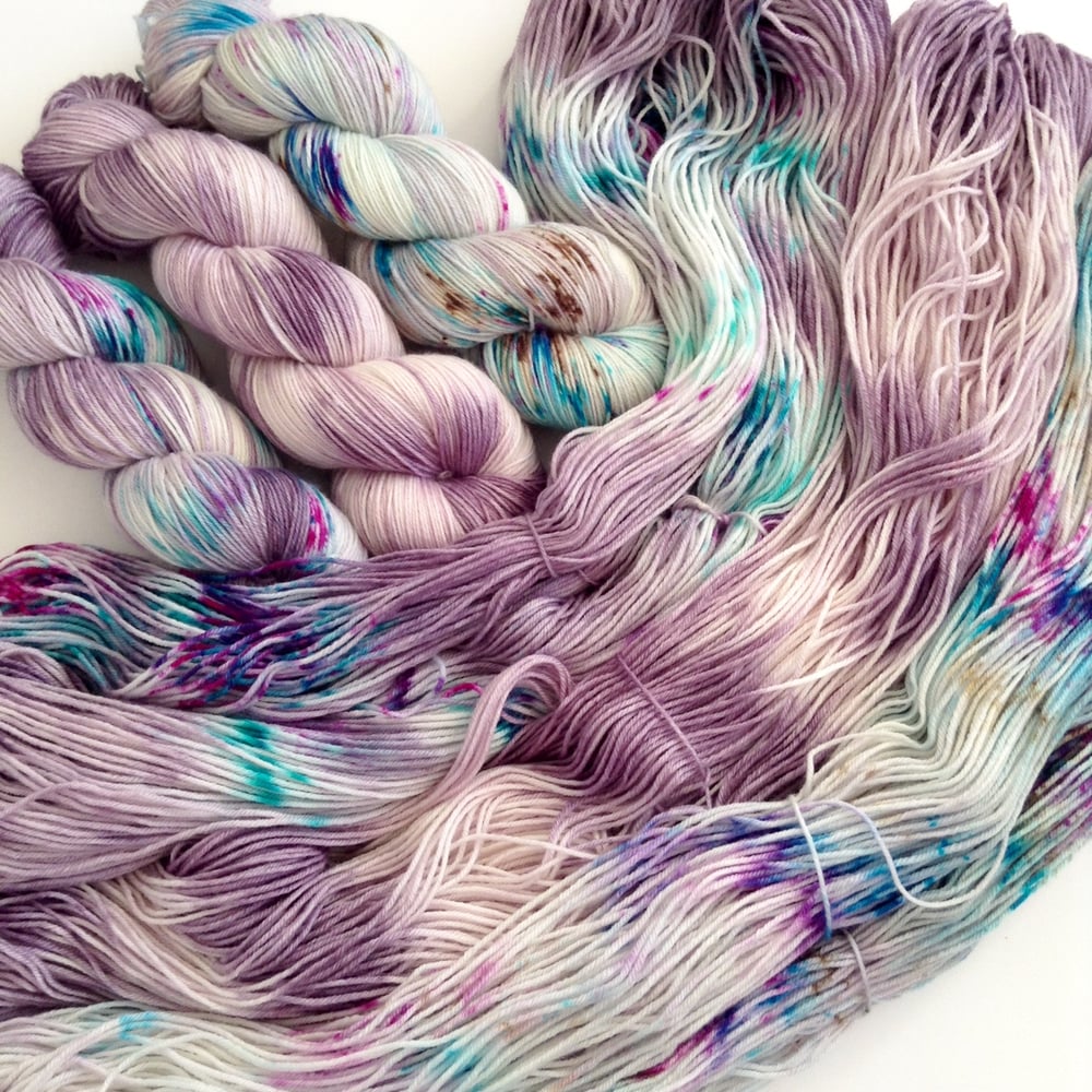 Image of Witch-Hunt set of 3 skeins. Hand Dyed Speckled 3-skein fade yarn set.