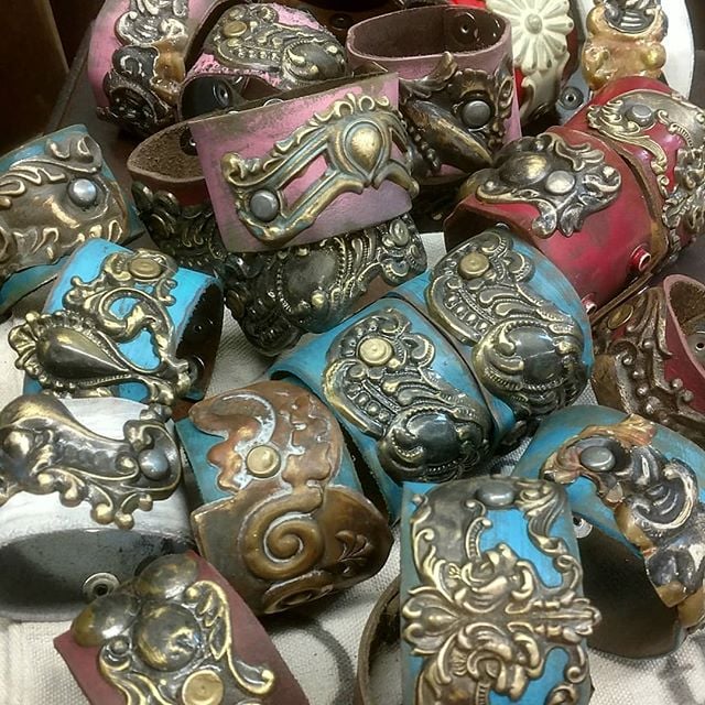 Image of handmade leather cuffs with antique salvaged elements