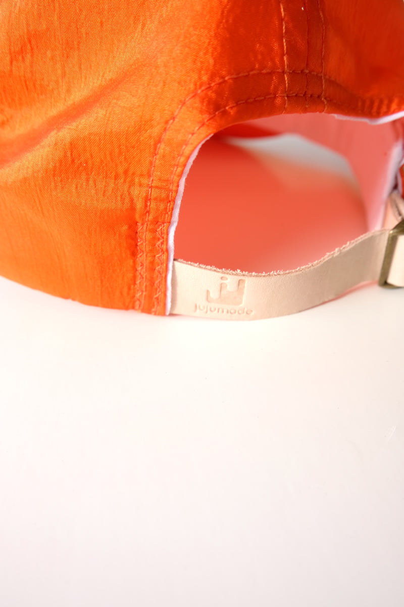 Image of orange nylon cap