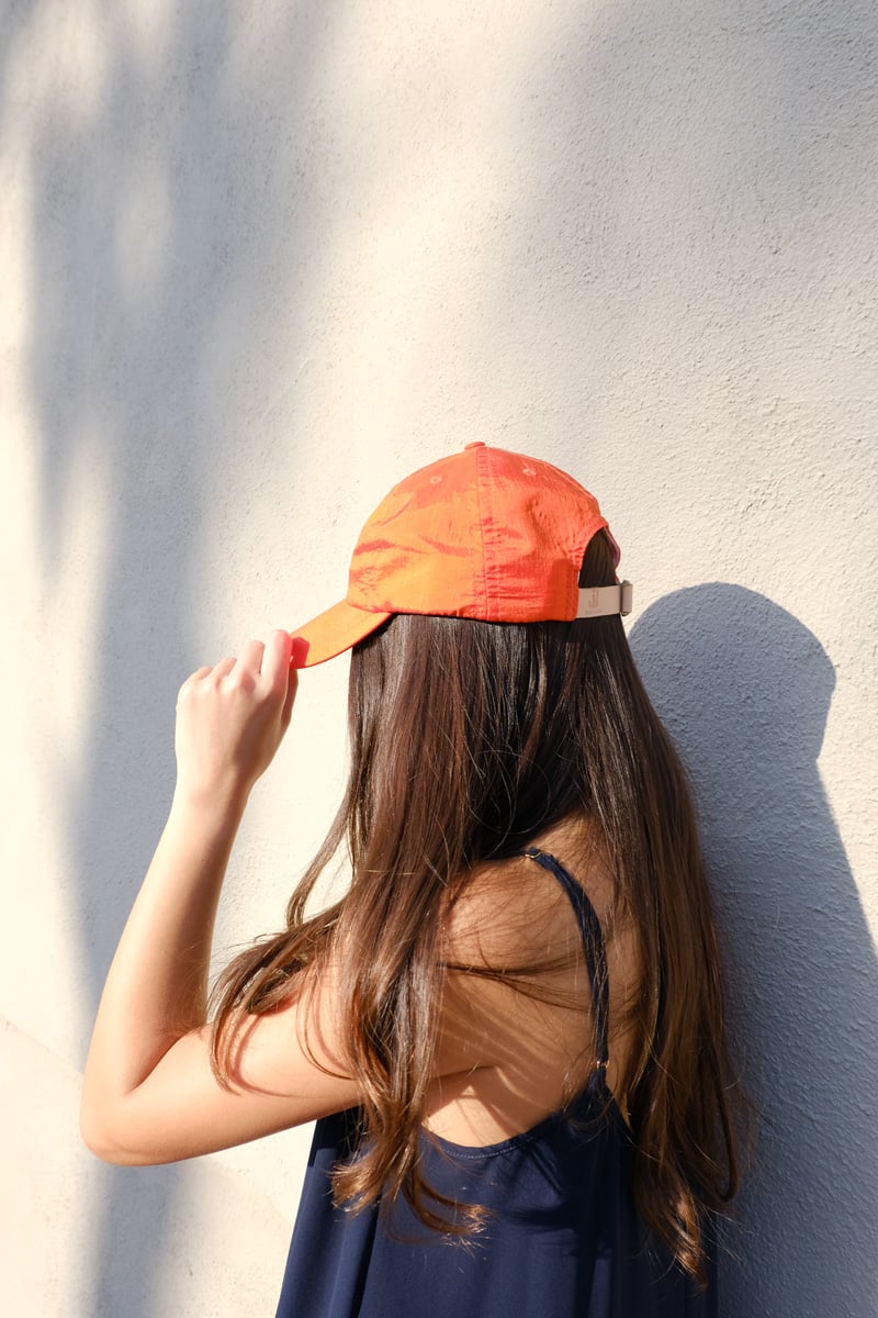 Image of orange nylon cap