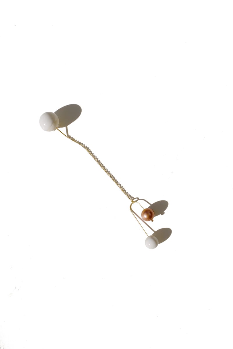 Image of pearl swing earring