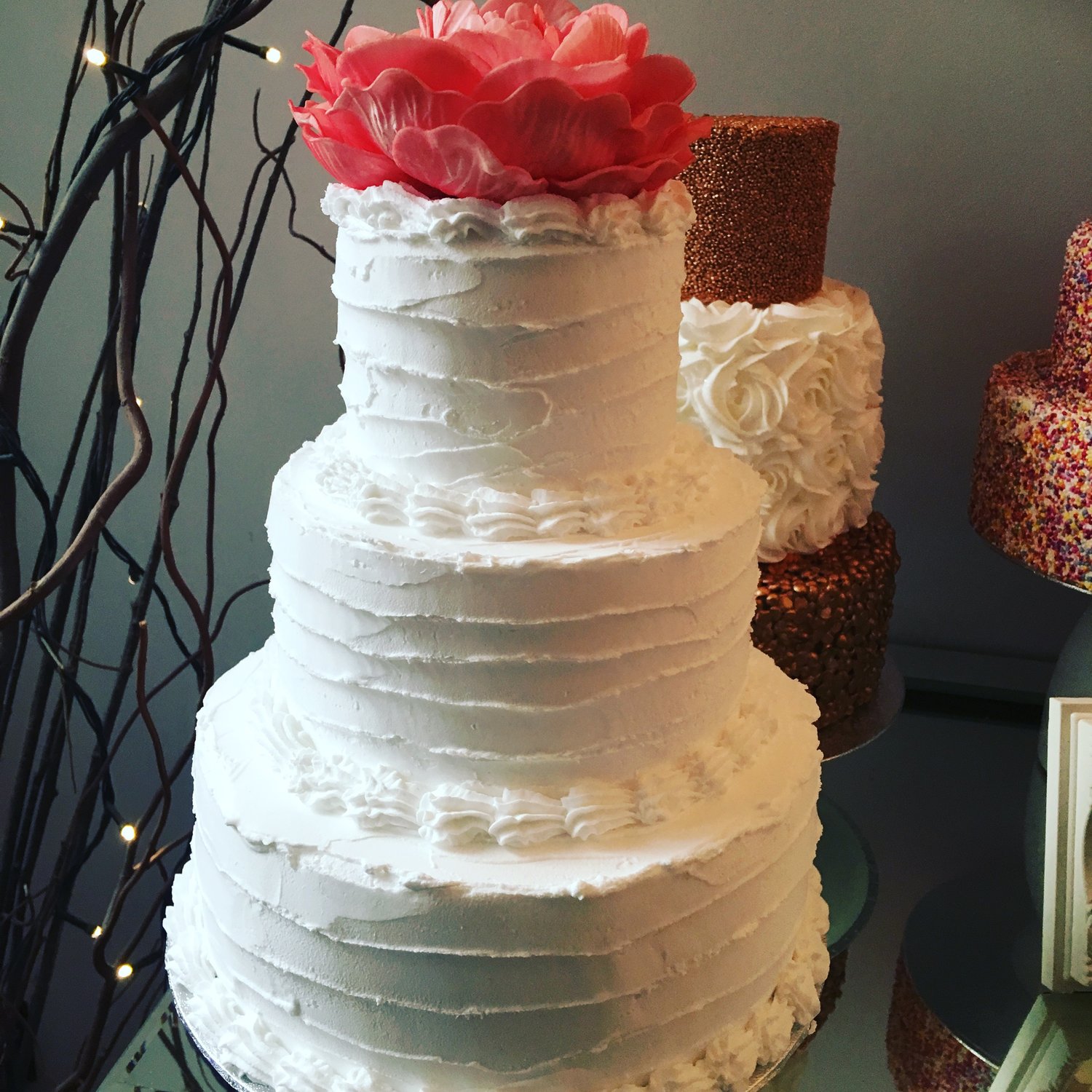 Image of Fake 3 tier rustic fake/faux cake with flower