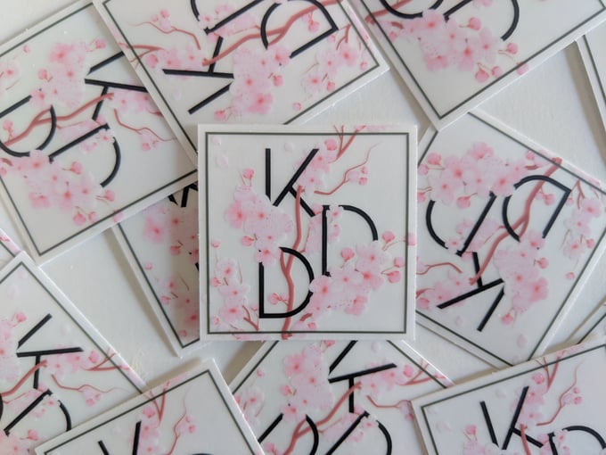 Image of KDD Logo Phone backer