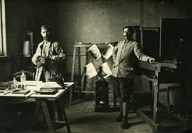 Image of WWI: two French soldiers working in a photo lab, ca. 1916