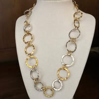 Image 4 of Necklace of gold & silver hammered rings