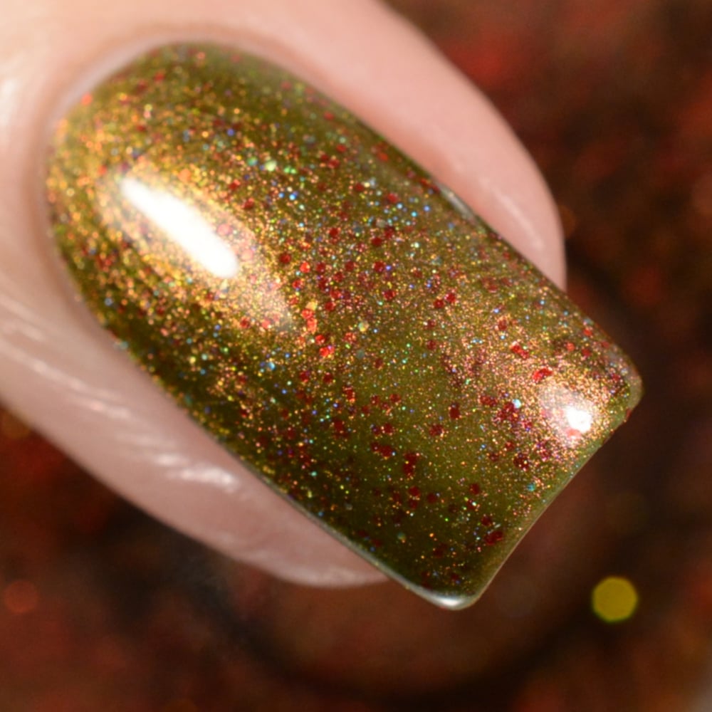 Image of ~I Saw Mommy Kissing Santa Claus~ red to gold to green multichrome w/red micro glitters and holo bit
