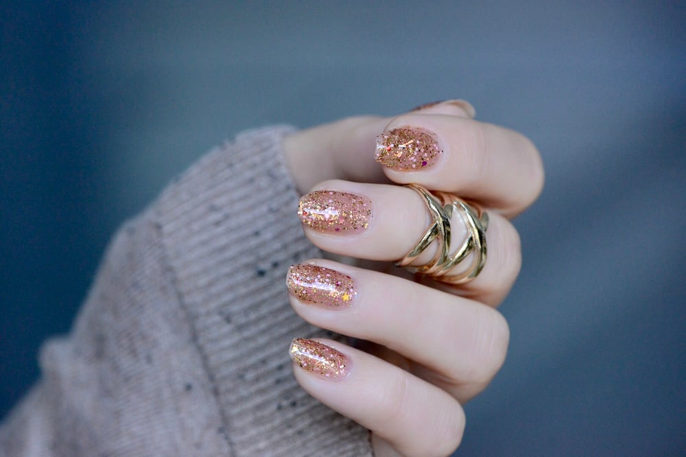 Image of ~Sleighbells Ring~ is a glitter top coat w/yellow, gold, magenta and pink glitters featuring lots of