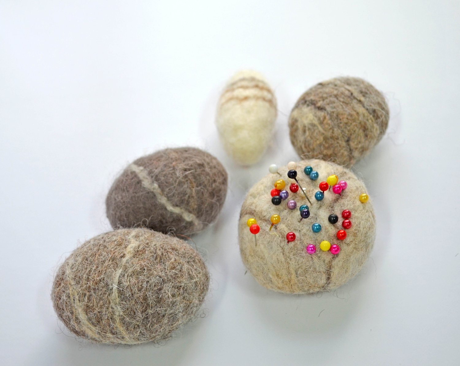 Image of Wet felted pebble pin cushion project