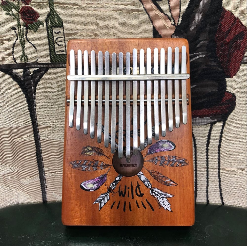 Image of Kalimba 17 Key design free wild feather