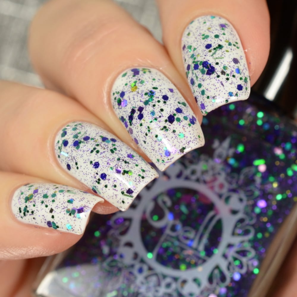 Image of ~Aurora Borealis~ glitter top coat w/purple, green, red and pink glitters featuring dots & diamonds!