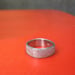 Image of platinum finger shaped ring 7mm x 1.5mm in deep freeze texture 