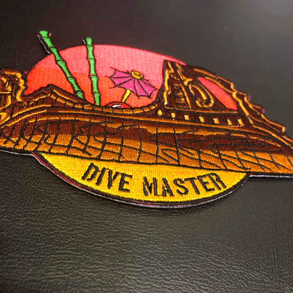 Image of 6” TS Nautilus “Dive Master” patch with iron on backing.