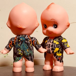 Image of tattooed kewpie by kumatora (peacock , monkies )