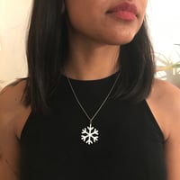 Vločka na řetízku