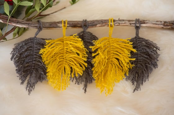 Image of Macrame feather wall art