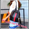 BLACK STRIPED BACKPACK/PURSE 