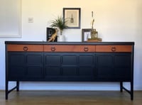 Image 1 of A black and teak Nathan sideboard 